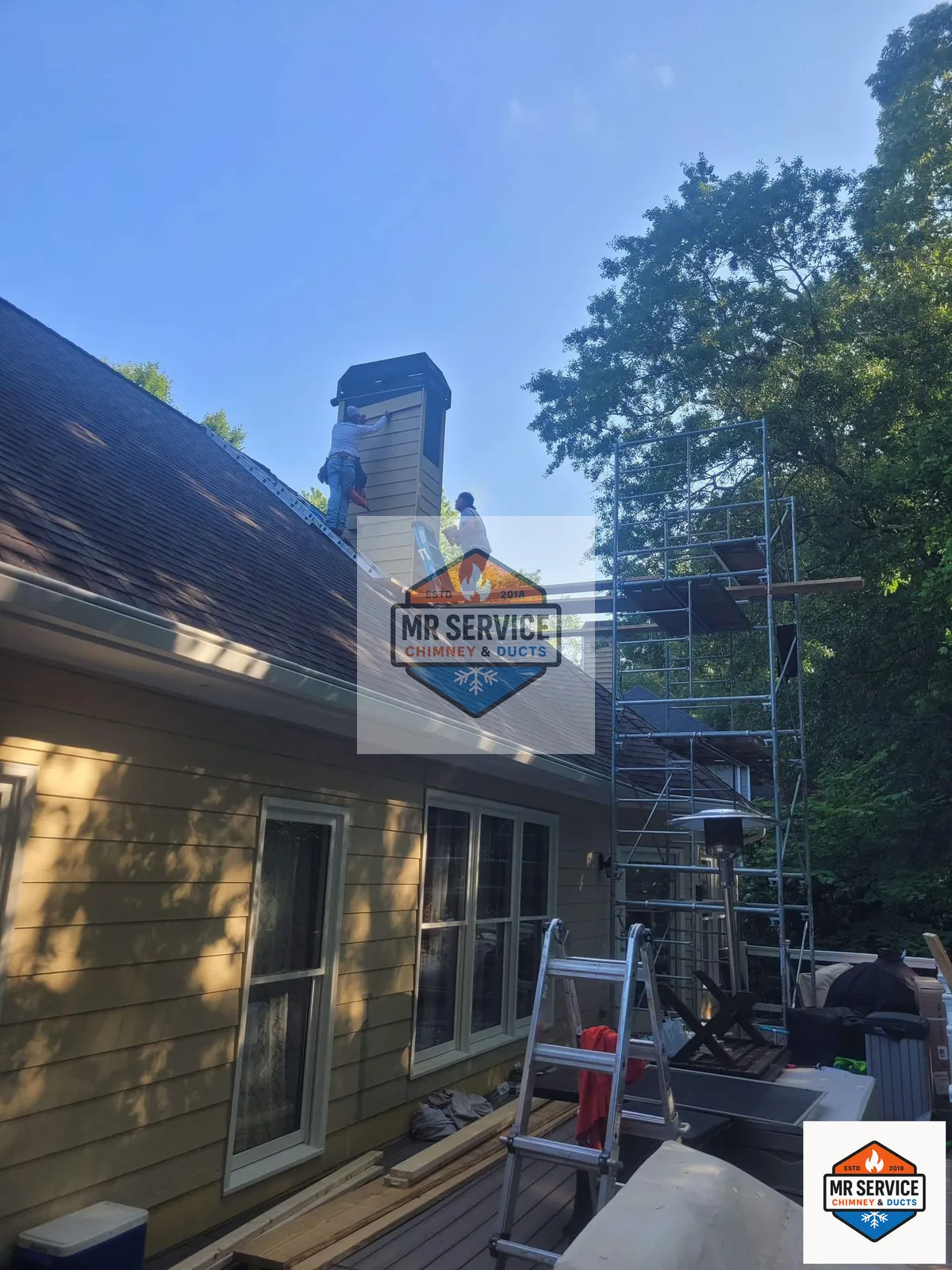 Scaffolding set up for chimney exterior work on a Twin Cities home