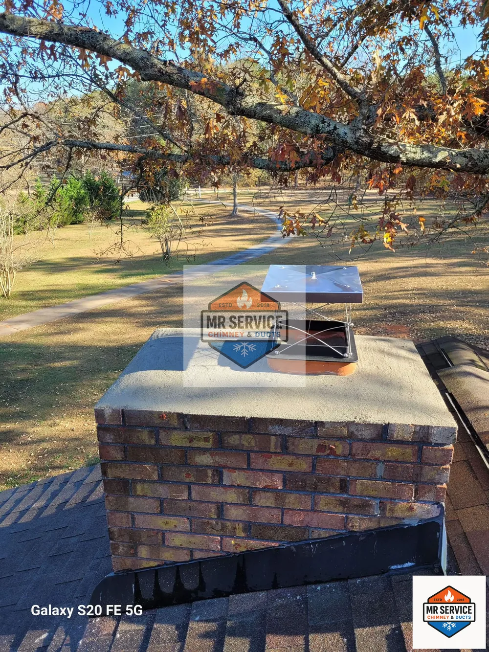 Finished cap and crown work on a brick chimney